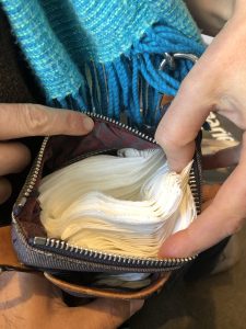 a lot of napkins inside a purse