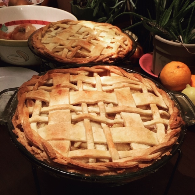 two pies with plaid style crust design