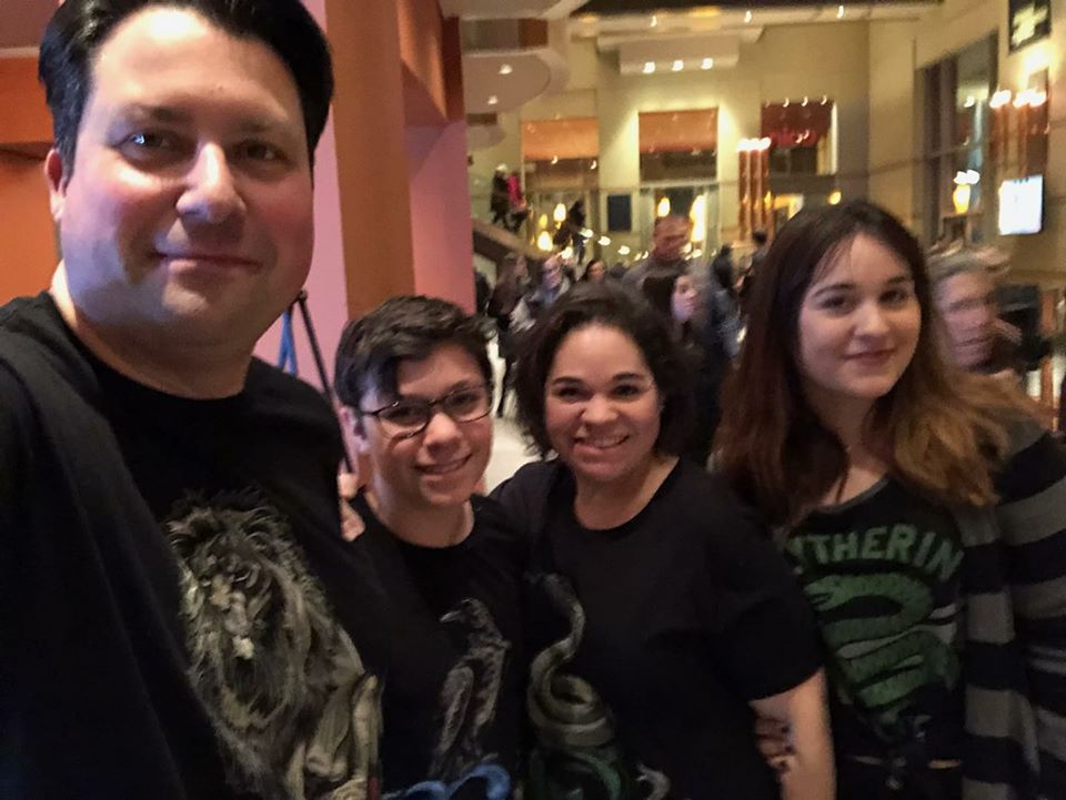 The family wearing Harry Potter shirts