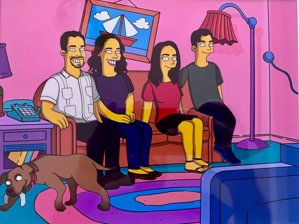 The family drawn in the Simpsons animation style