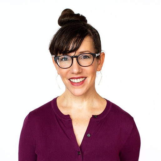 a woman wearing glasses 