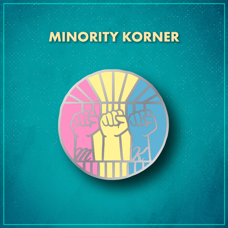 Minority Korner. A circle with three closed fists coming up from the bottom with the letter "M" on the wrist to the left and the letter "K" on the wrist to the right. The pin is vertically divided into a pink, yellow, and blue thirds.