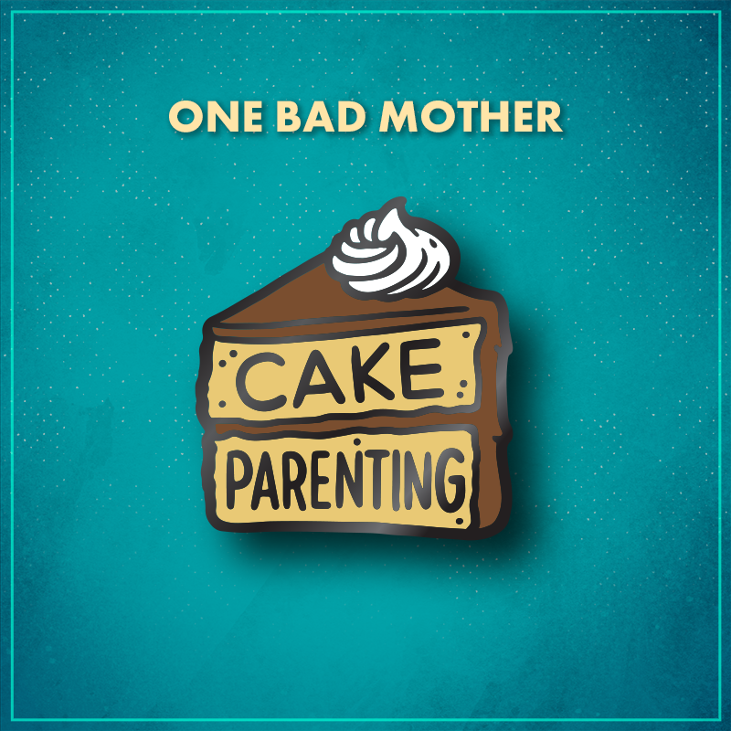 One Bad Mother. A slice of yellow layer cake with brown frosting and a swirl of white whipped cream on top. The top layer of the cake says "Cake" and the bottom says "Parenting."