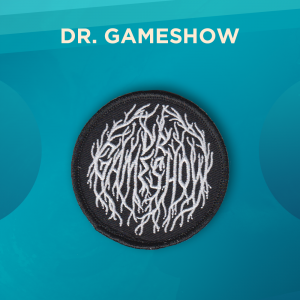 Dr. Gameshow. A black circular patch with white root-like embellishments covering the surface. Some of the roots spell out DR. GAMESHOW.