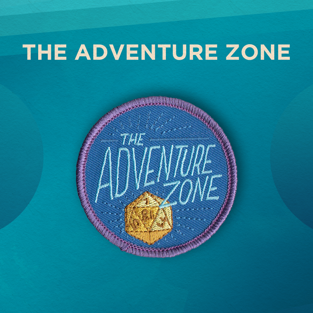 The Adventure Zone. The words The Adventure Zone in light blue letters and a gold 20-sided die on a darker blue background.