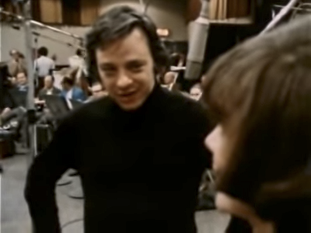 A low-resolution screenshot from the D.A. Pennebaker documentary 