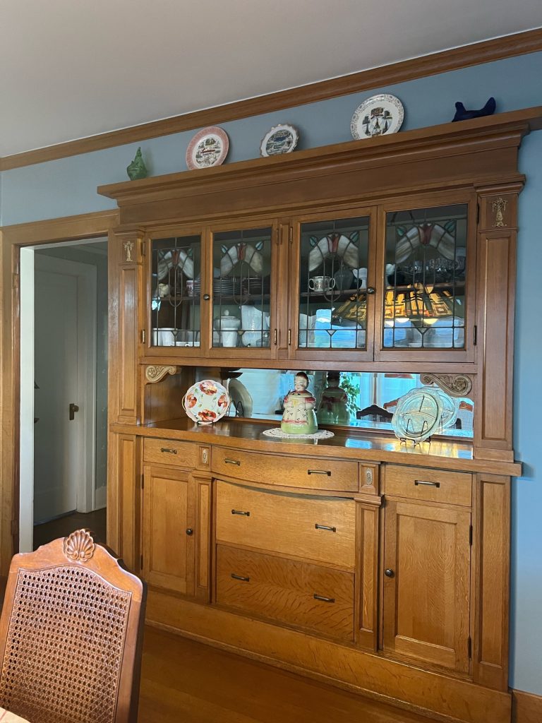 a large built in china cabinet