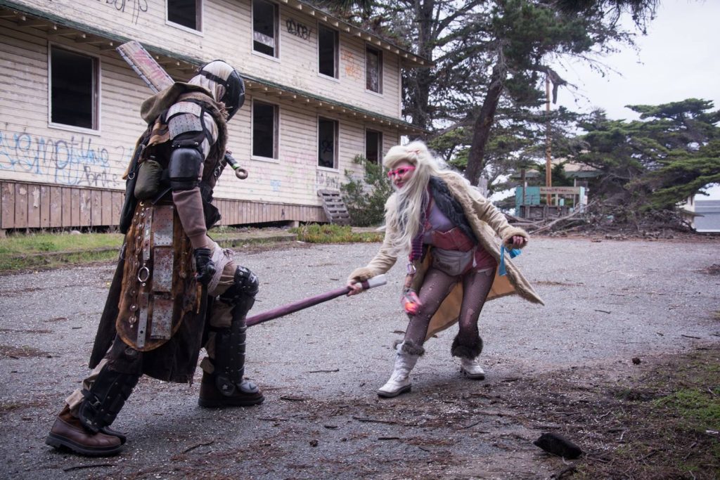 Two people LARPing in costume
