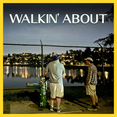 Mike Mitchell (left) and Allan McLeod (right) stand together facing the Silverlake Reservoir at sundown.