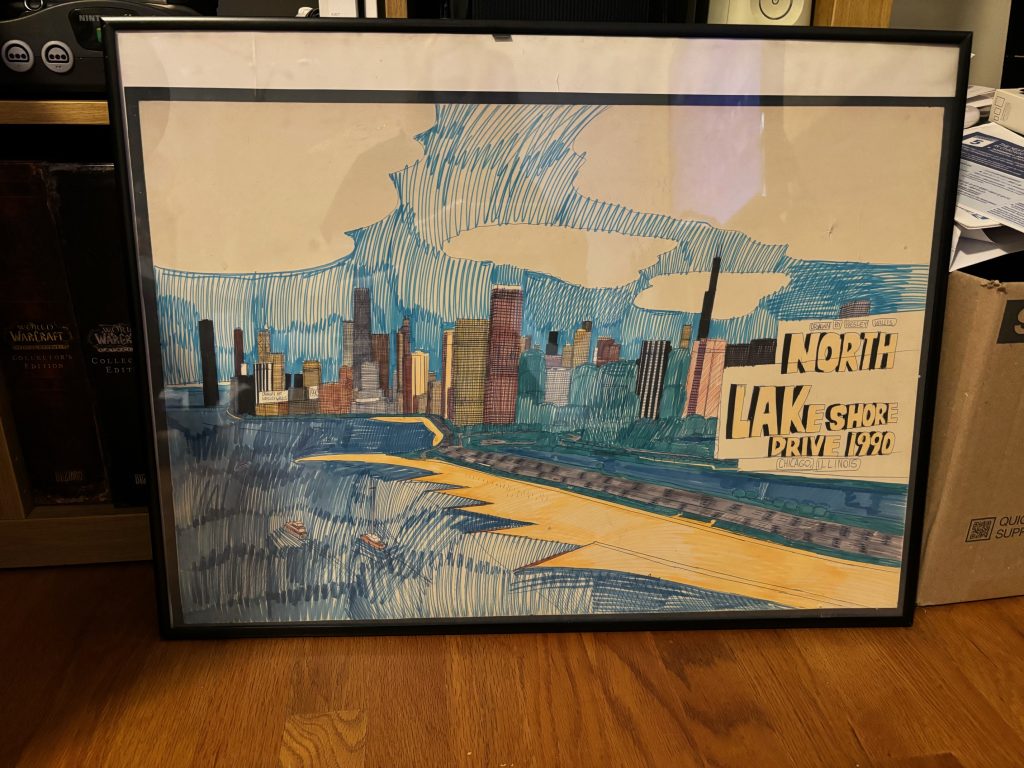 A piece of drawn art that depicts a city skyline and says 