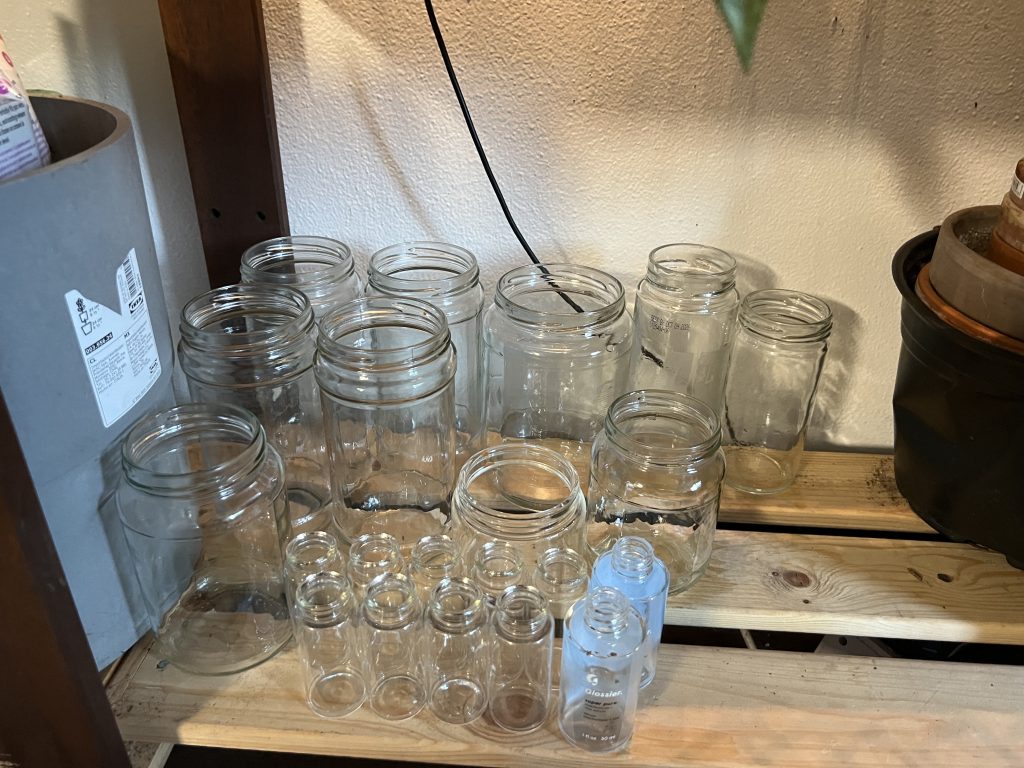 empty glass containers on a shelf