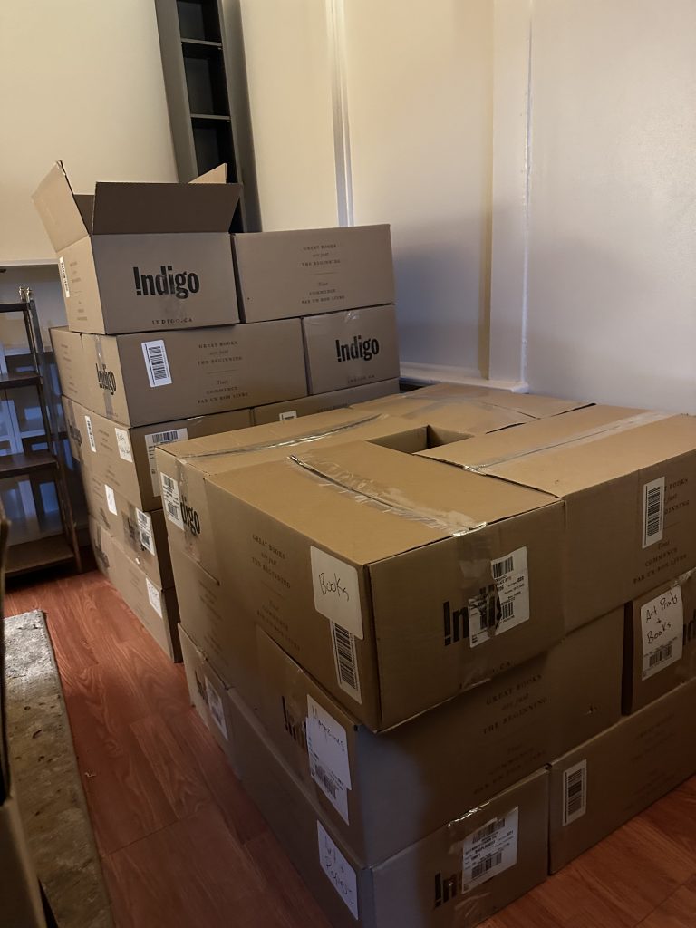 Several moving boxes stacked neatly