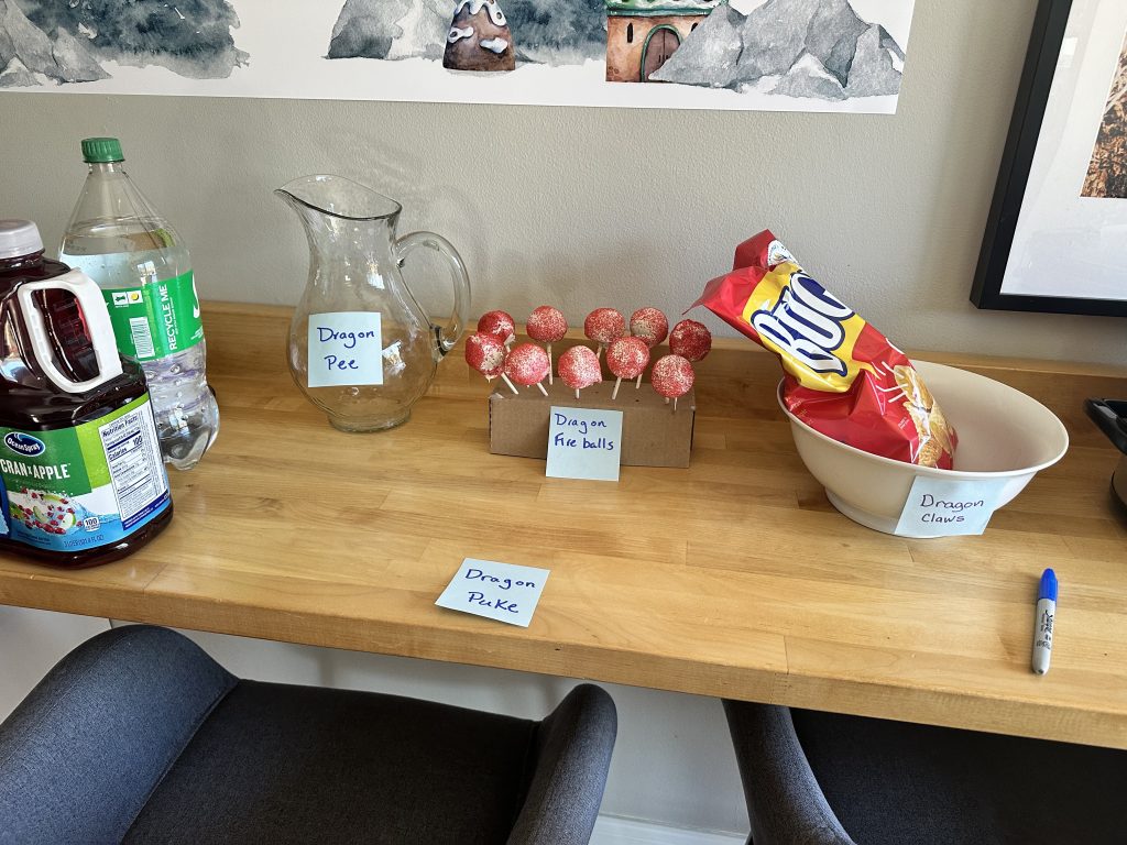 A table with an empty pitcher on it labeled 