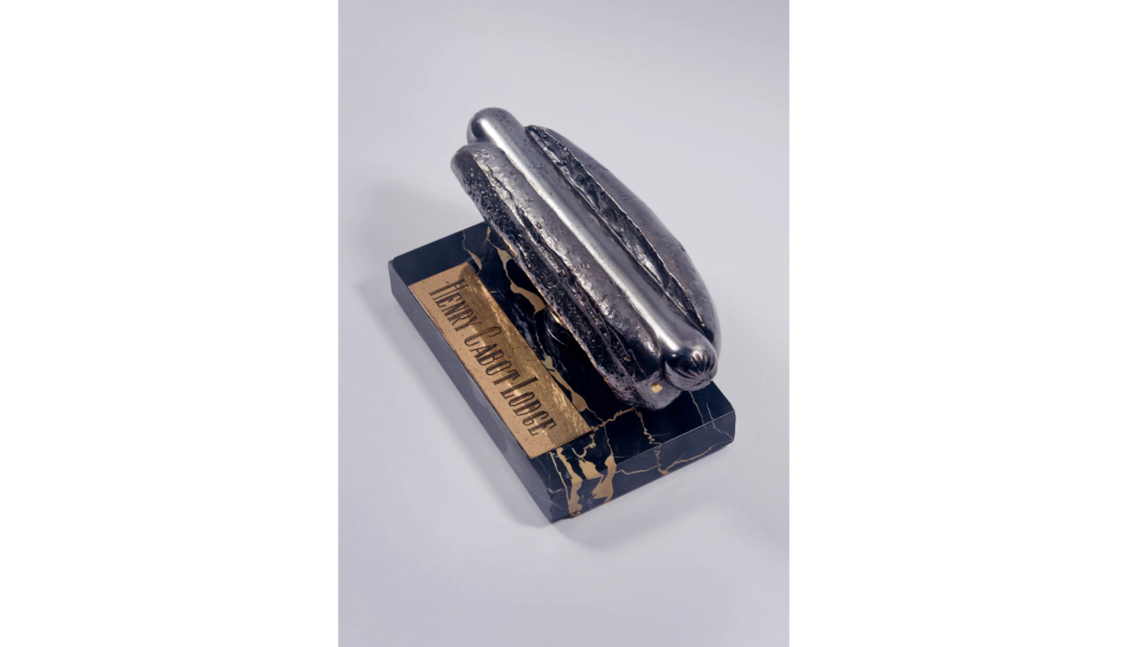 A hot dog encased in bronze