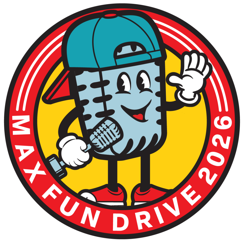 A smiling old timey microphone that is holding a microphone that looks just like him. He's wearing a backwards hat and standing inside a circle that says MaxFunDrive 2026.