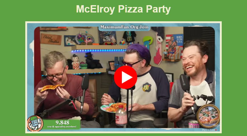 A screenshot from the video of the three boys in the same room eating pizza.