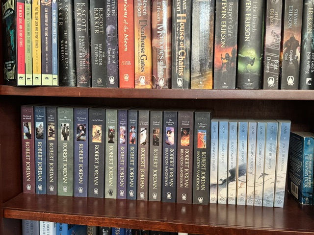 Part of a bookcase, full of books